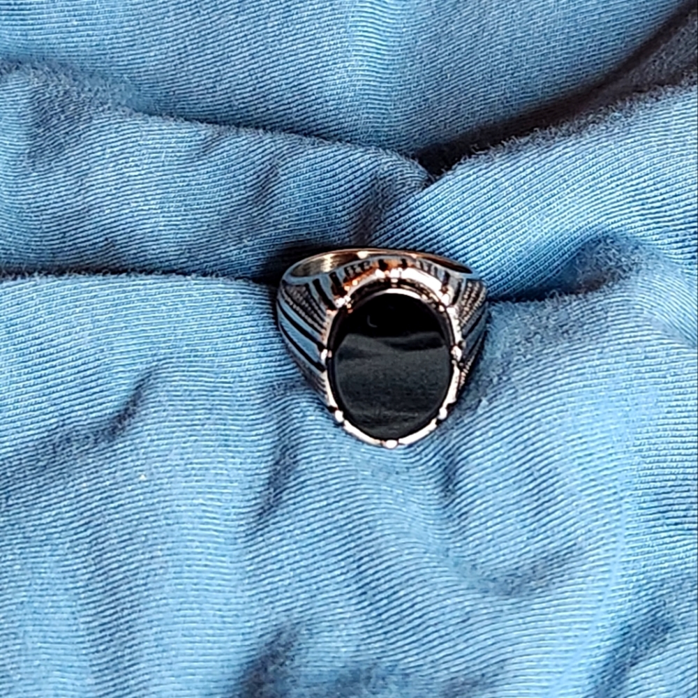 Size 10 stainless  black onyx ring.